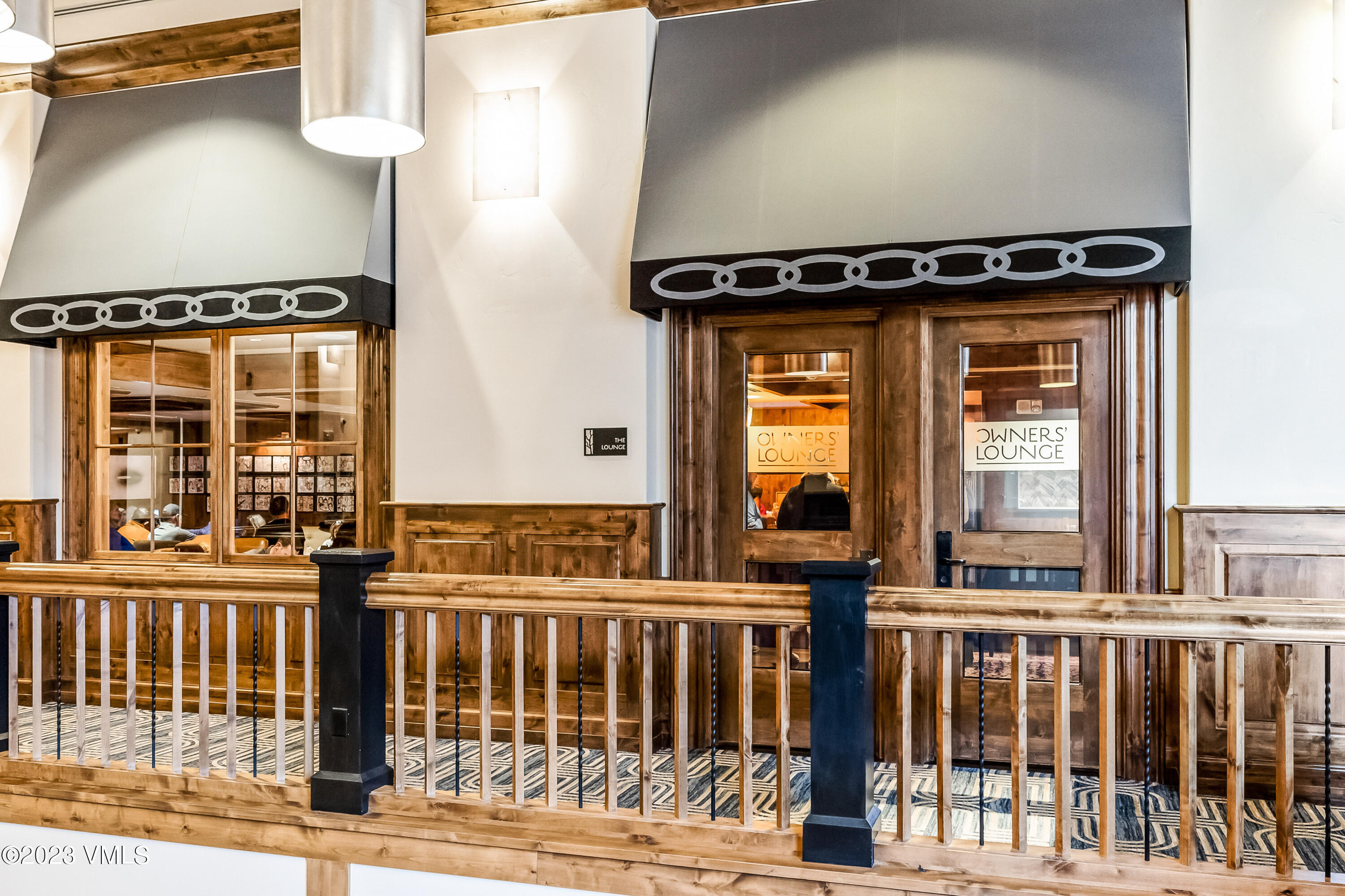 16 Vail Road, Unit RESORT MEMBERSHIP Vail, CO 81657 - Photo 33 of 51 a view of a brick house with large windows