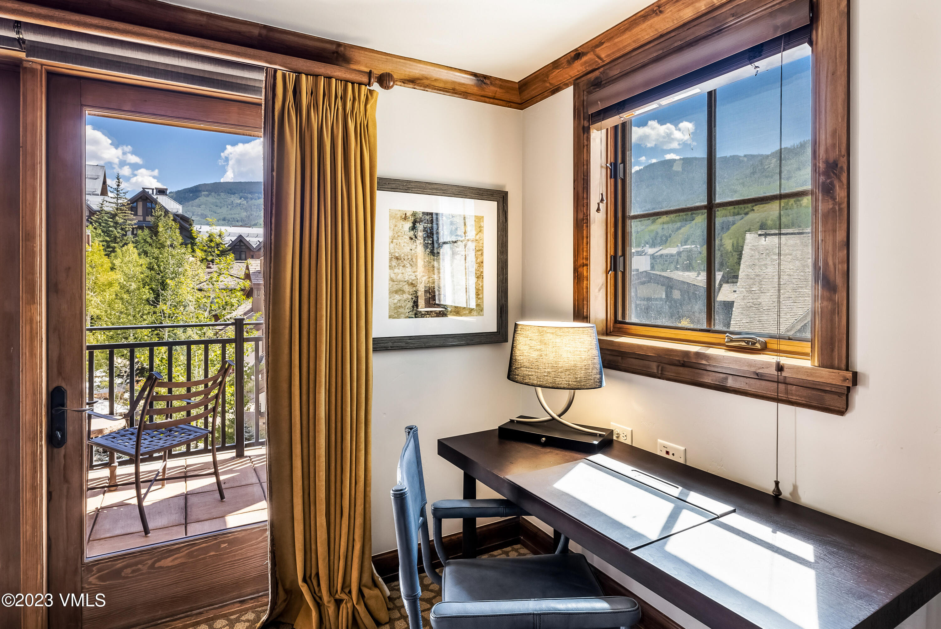 16 Vail Road, Unit RESORT MEMBERSHIP Vail, CO 81657 - Photo 45 of 51 a room with furniture and a window