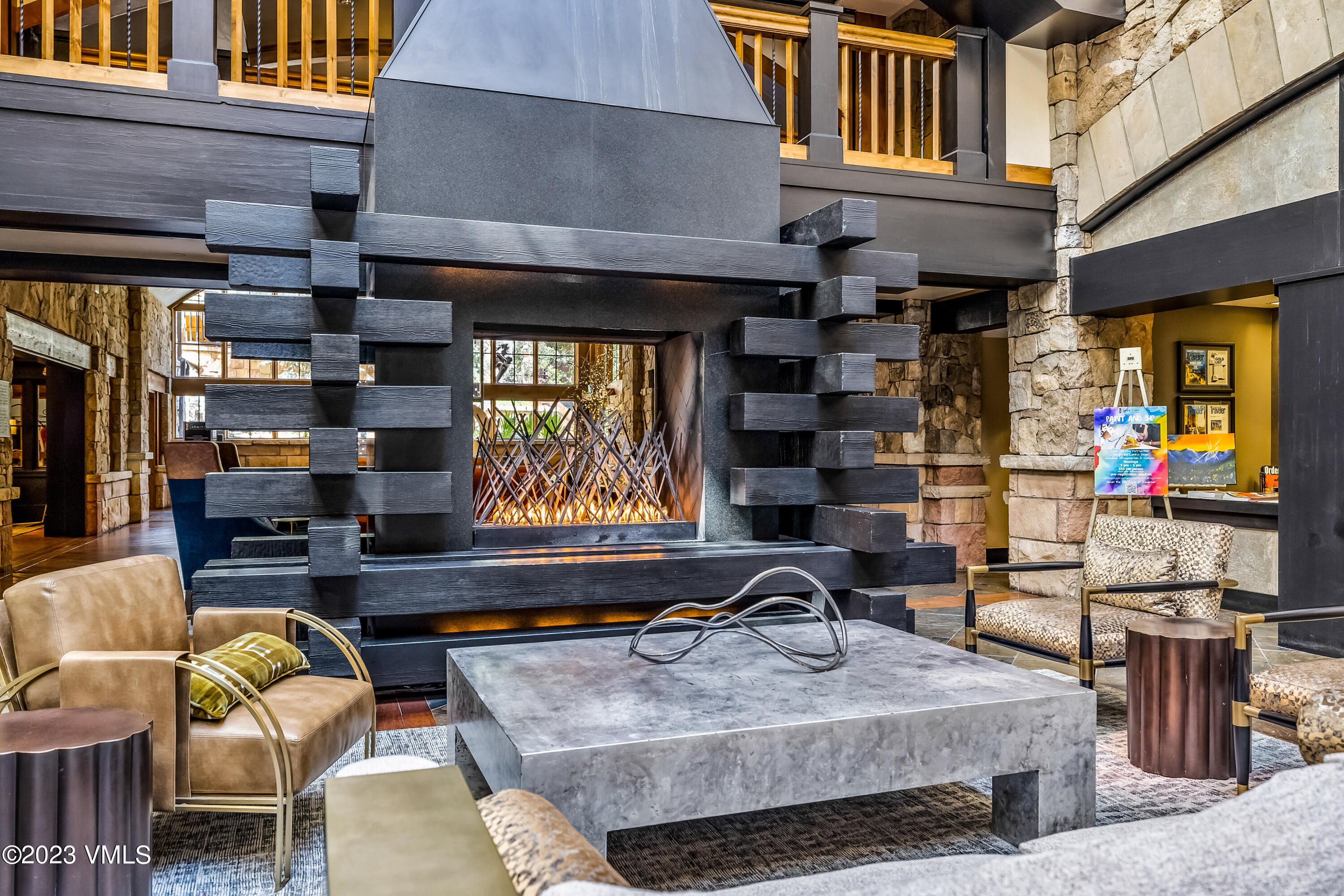 16 Vail Road, Unit RESORT MEMBERSHIP Vail, CO 81657 - Photo 49 of 51 a living room filled with furniture and a flat screen tv