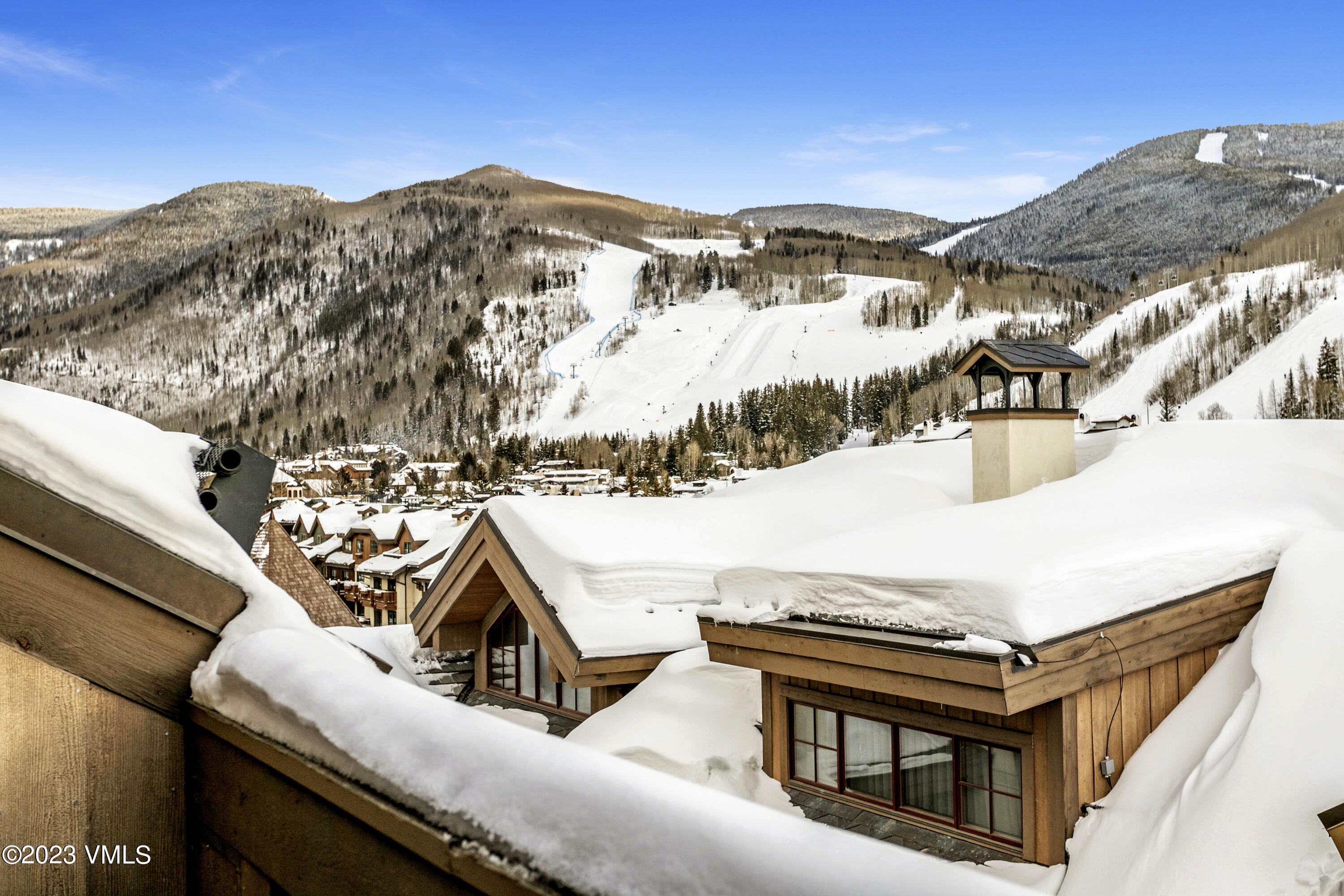 16 Vail Road, Unit RESORT MEMBERSHIP Vail, CO 81657 - Photo 10 of 51 a view of a terrace with a snow