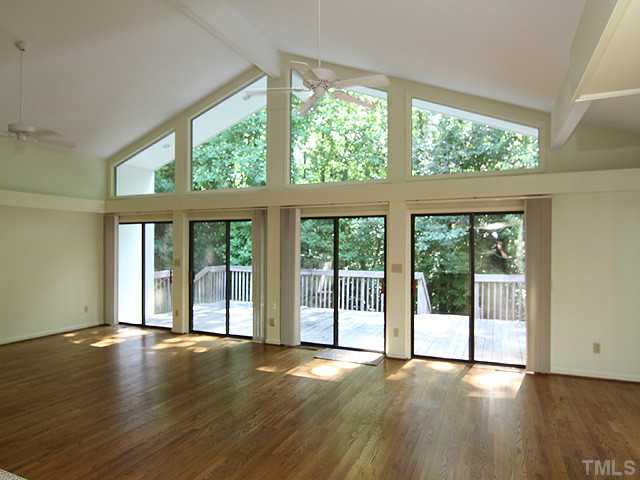 4818 Oak Park Road Raleigh, NC 27612 - Photo 7 of 25 Create living spaces to suit your style of living. Perfect space for entertaining, multigenerational family gatherings; host special interest group meetings. Owner had three zones: one are for a piano, dining, sitting area with TV.