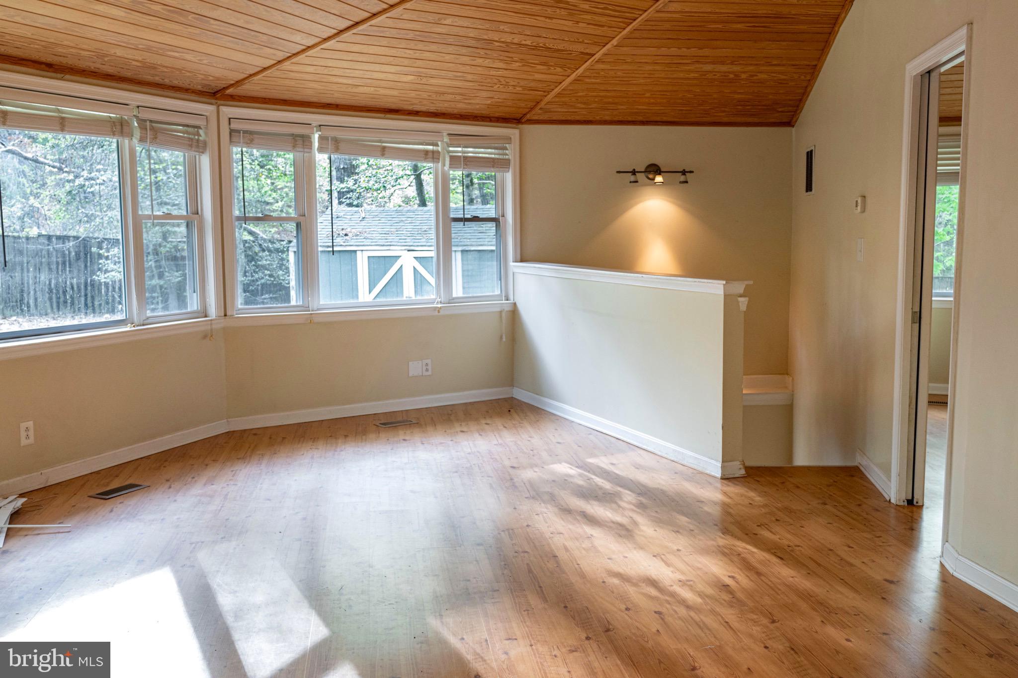 12433 Cree Lane Lusby, MD 20657 - Photo 6 of 28 Living room with plents of natural light