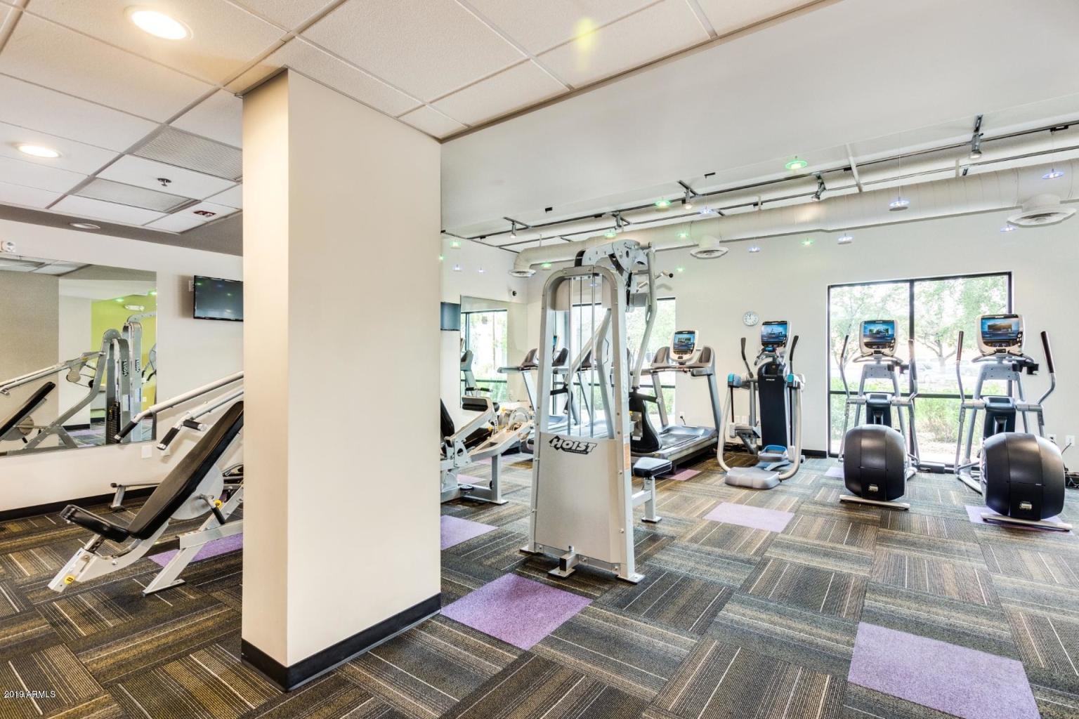 535 West Thomas Road, Unit 211 Phoenix, AZ 85013 - Photo 16 of 24 a view of a room with gym equipment