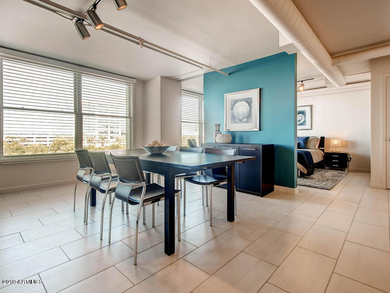 535 West Thomas Road, Unit 211 Phoenix, AZ 85013 - Photo 5 of 24 a view of a dining room with furniture