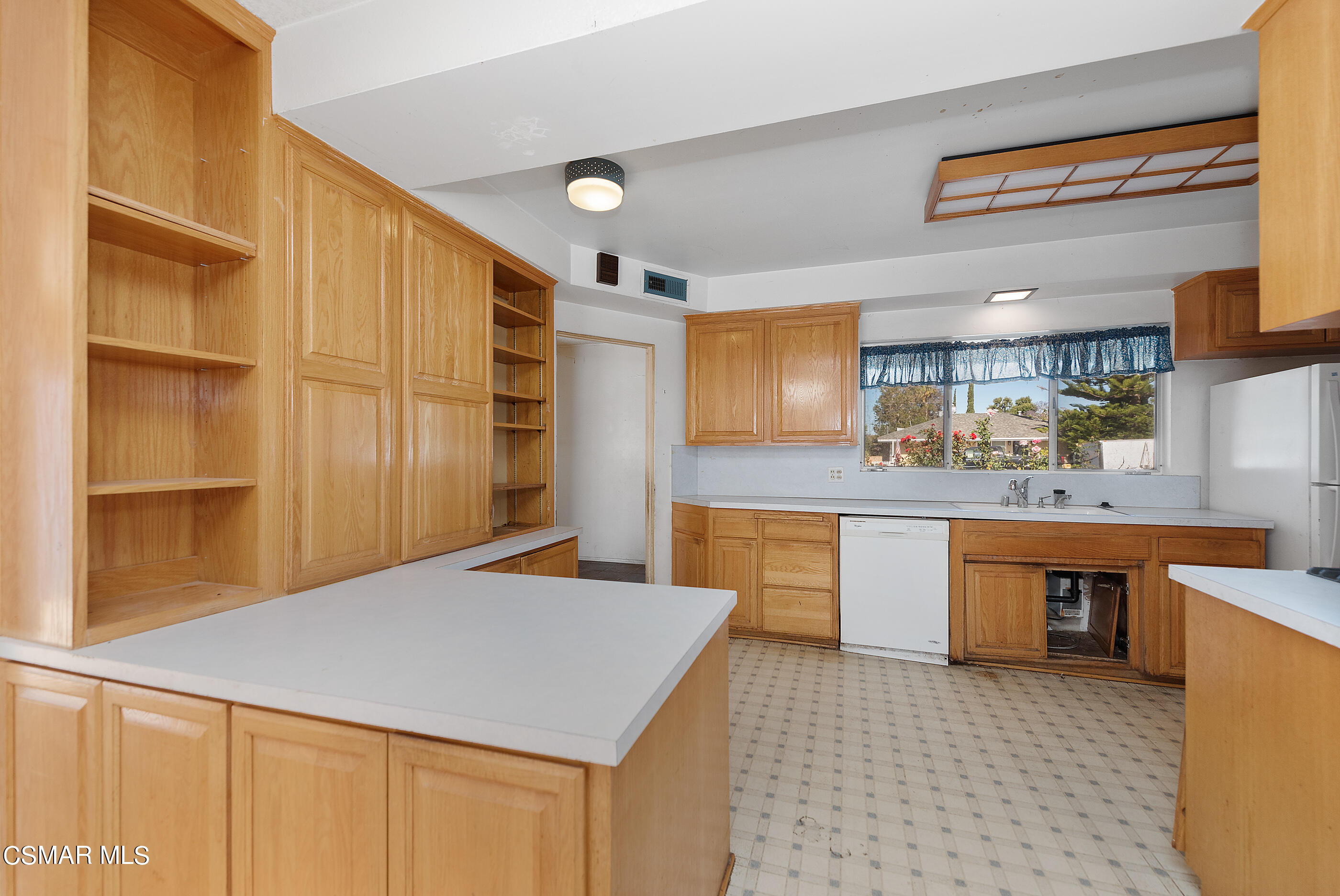 3140 Sheri Drive Simi Valley, CA 93063 - Photo 12 of 38 a kitchen with stainless steel appliances a sink and cabinets