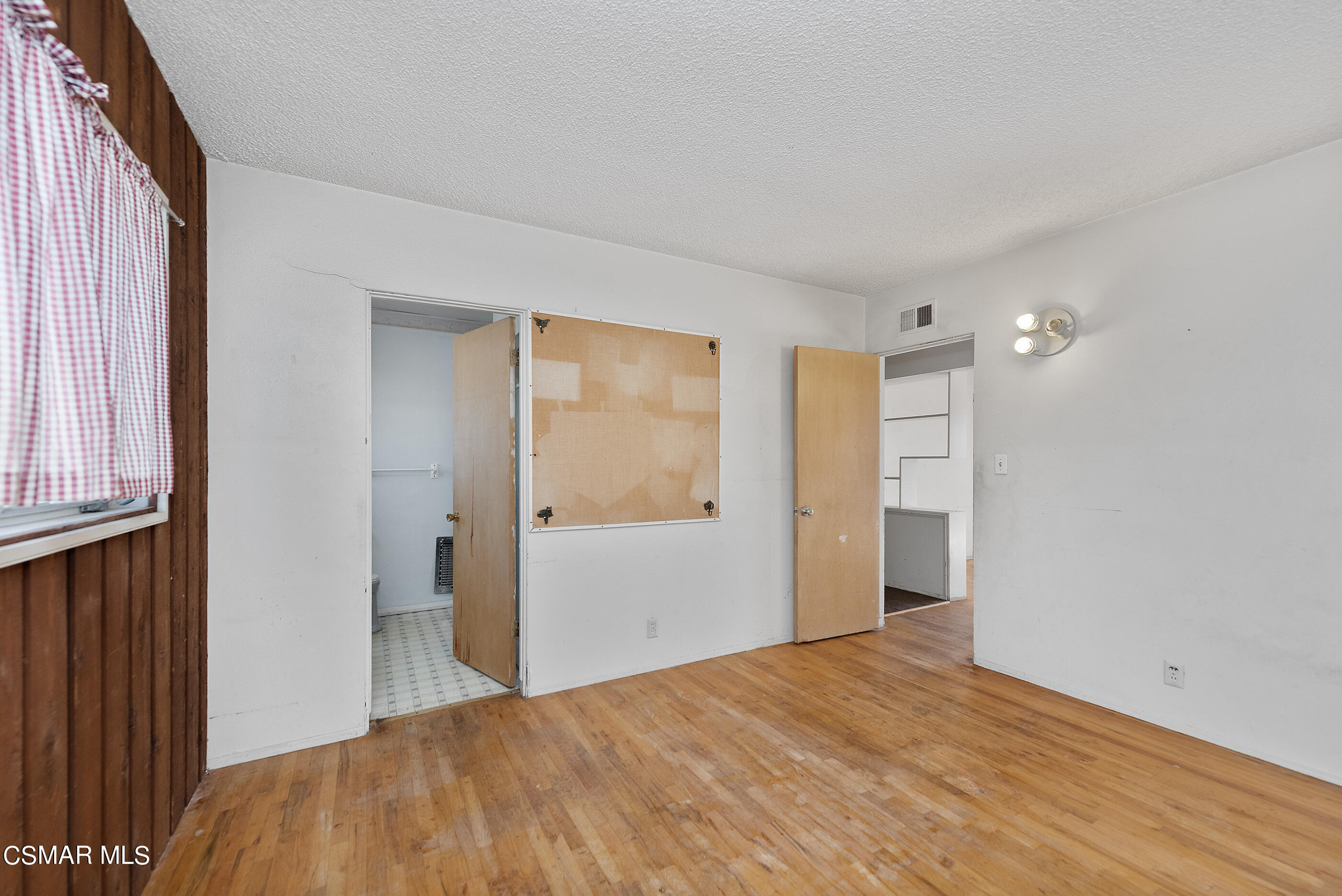 3140 Sheri Drive Simi Valley, CA 93063 - Photo 19 of 38 a view of empty room with wooden floor and fan