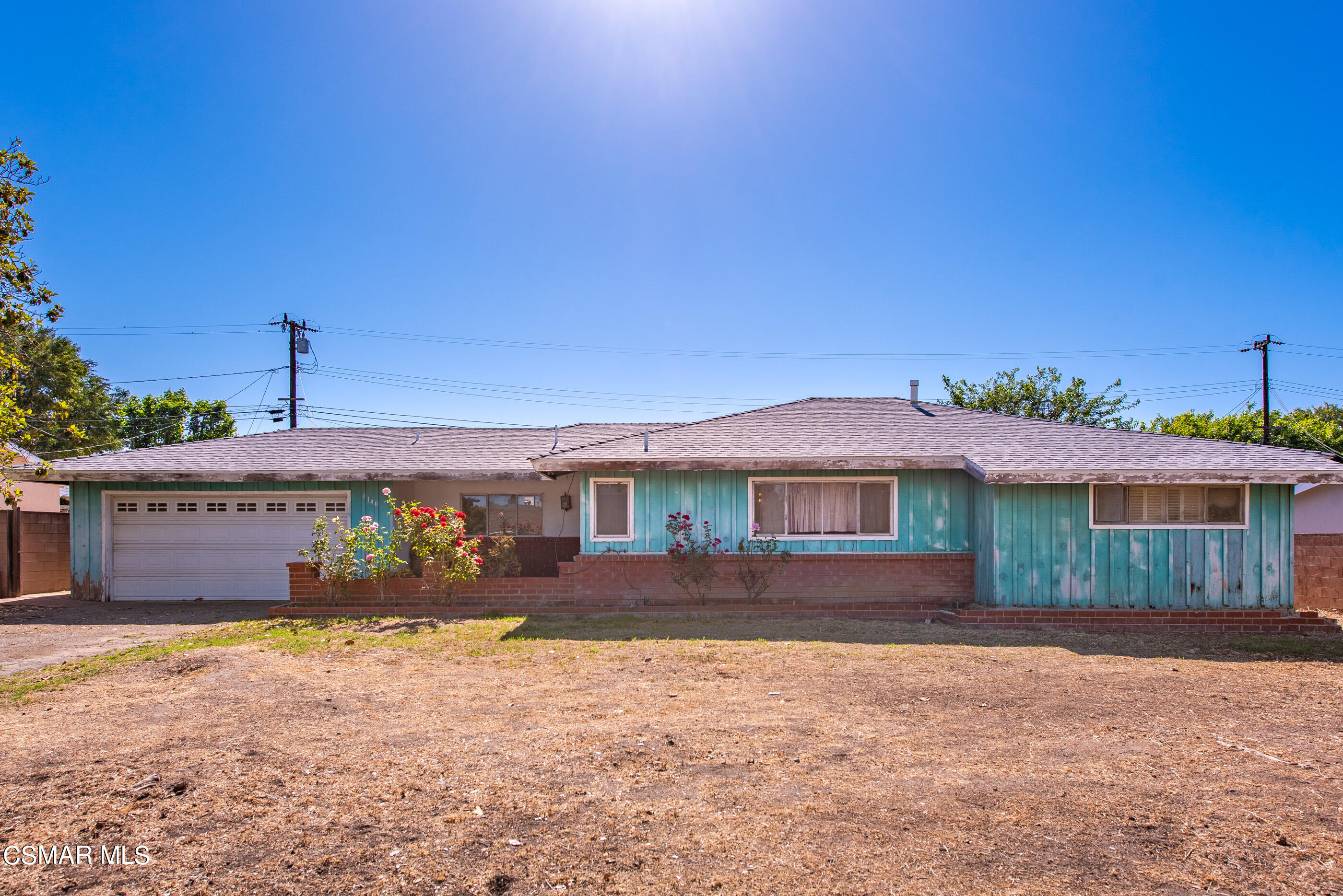 3140 Sheri Drive Simi Valley, CA 93063 - Photo 5 of 38 a front view of a house with a yard
