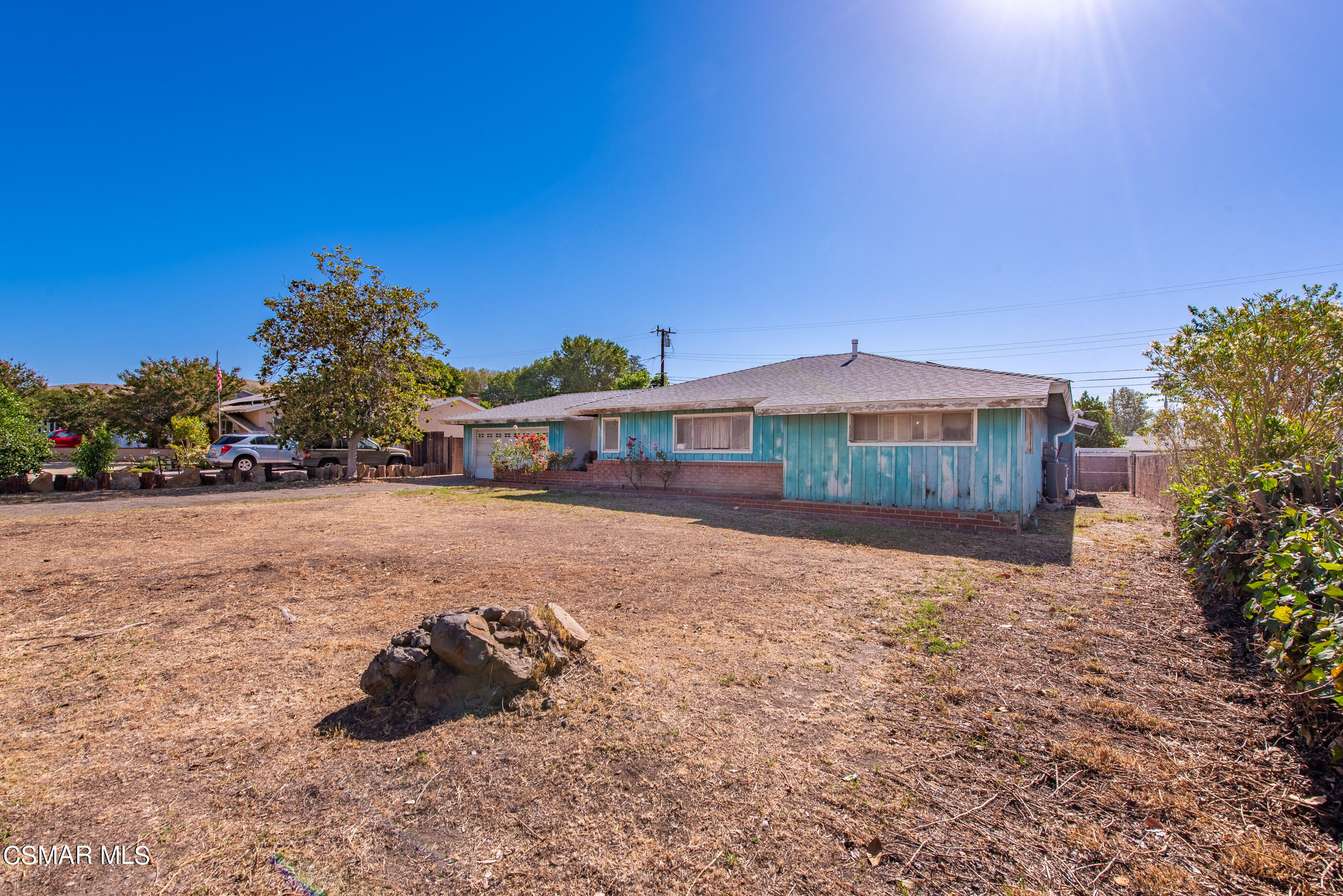 3140 Sheri Drive Simi Valley, CA 93063 - Photo 6 of 38 a front view of a house with a yard
