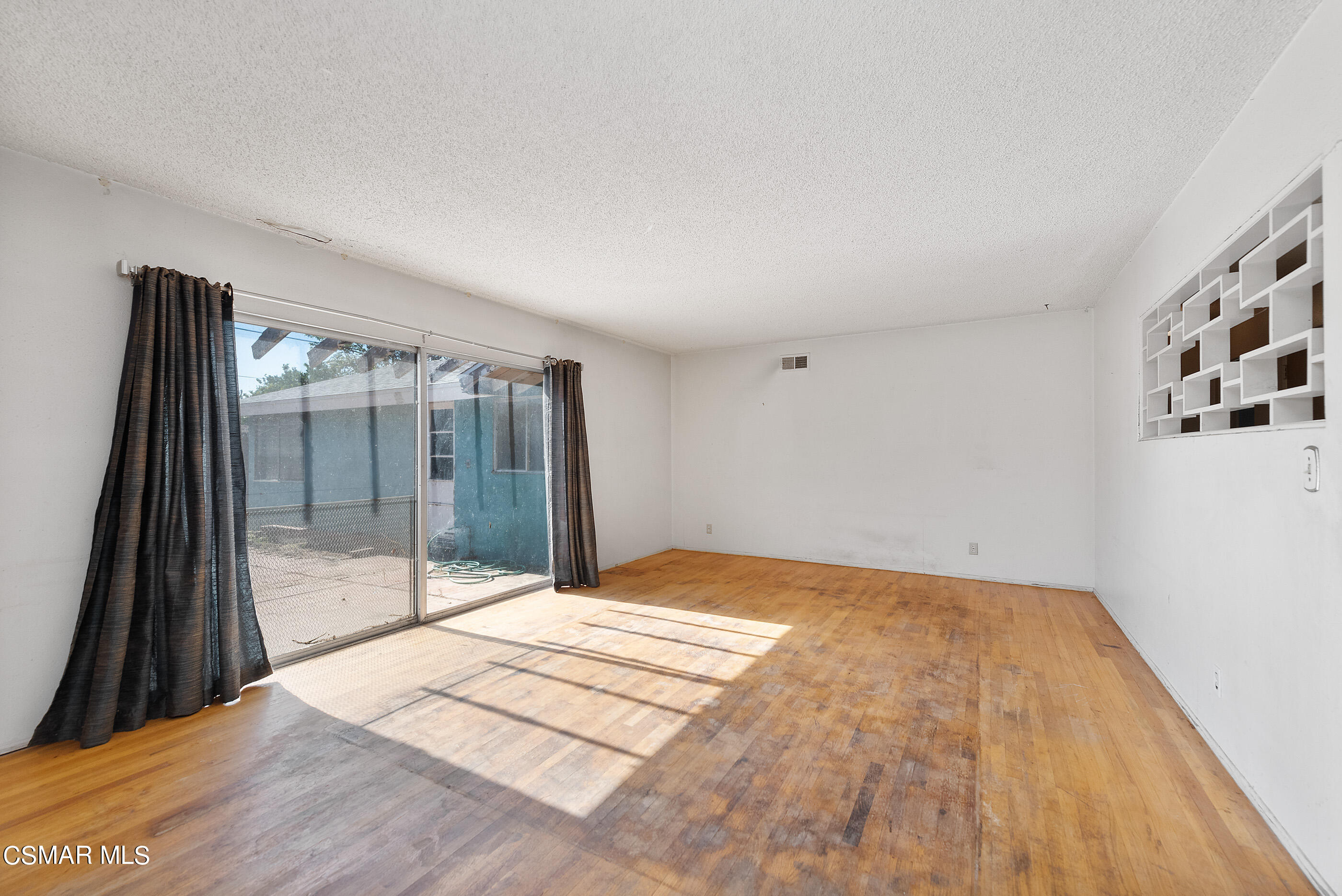 3140 Sheri Drive Simi Valley, CA 93063 - Photo 8 of 38 a bedroom with a bed and glass door