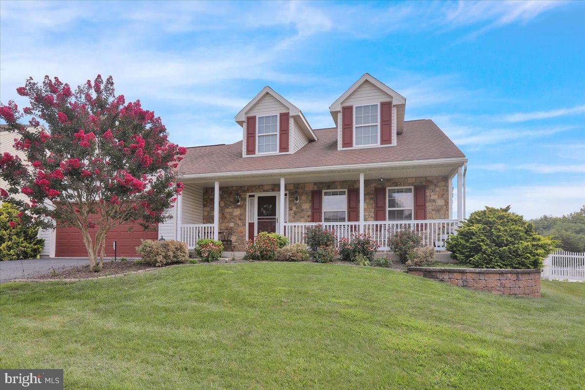 2509 Joshua Drive Sinking Spring, PA 19608 - Photo 1 of 35 a front view of a house with garden