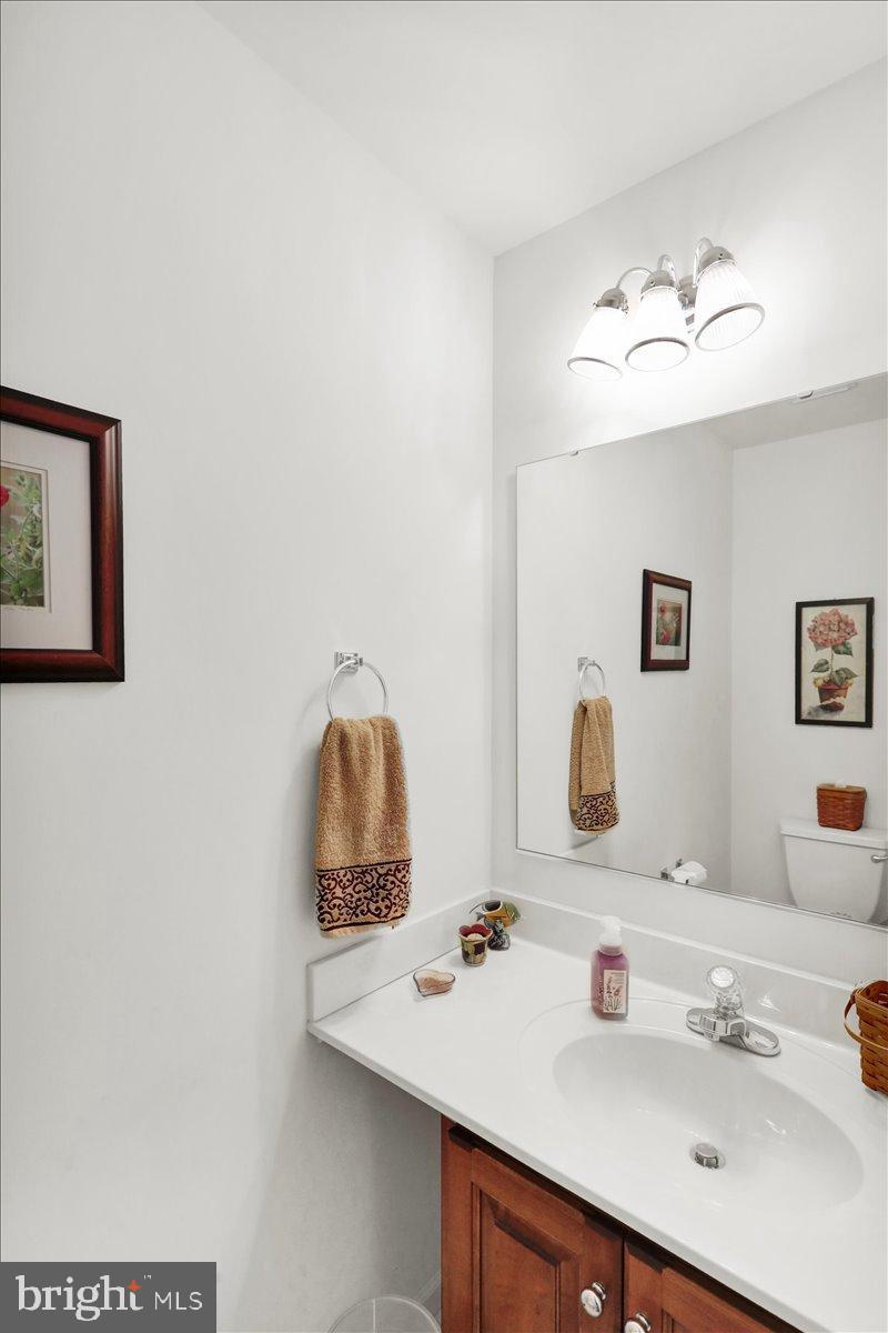 2509 Joshua Drive Sinking Spring, PA 19608 - Photo 13 of 35 a bathroom with a sink and a mirror