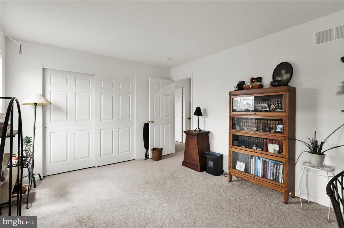 2509 Joshua Drive Sinking Spring, PA 19608 - Photo 26 of 35 a view of a livingroom with shelves