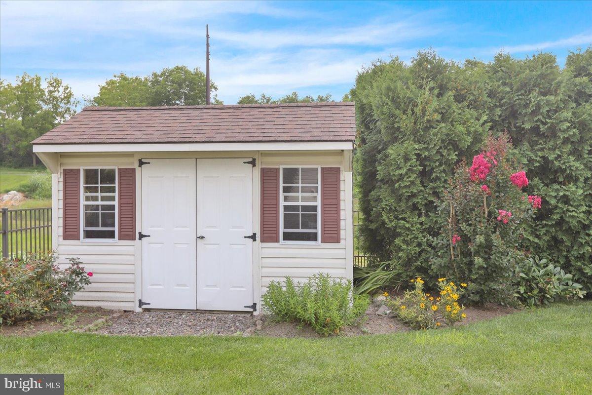 2509 Joshua Drive Sinking Spring, PA 19608 - Photo 30 of 35 a front view of a house with garden