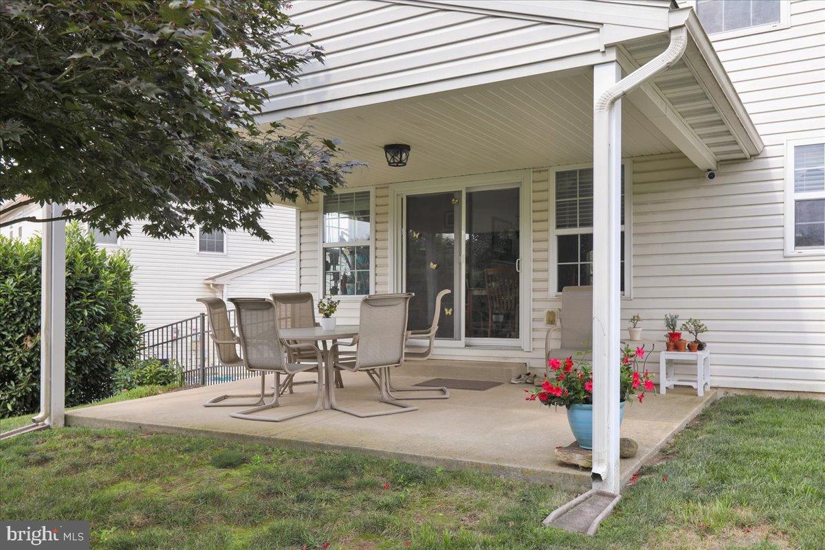 2509 Joshua Drive Sinking Spring, PA 19608 - Photo 31 of 35 a view of a house with backyard and sitting area