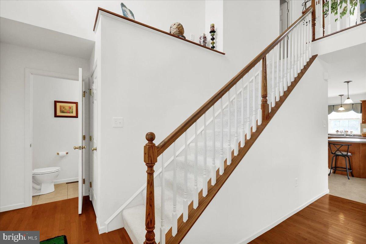 2509 Joshua Drive Sinking Spring, PA 19608 - Photo 9 of 35 a view of entryway with wooden floor and stairs