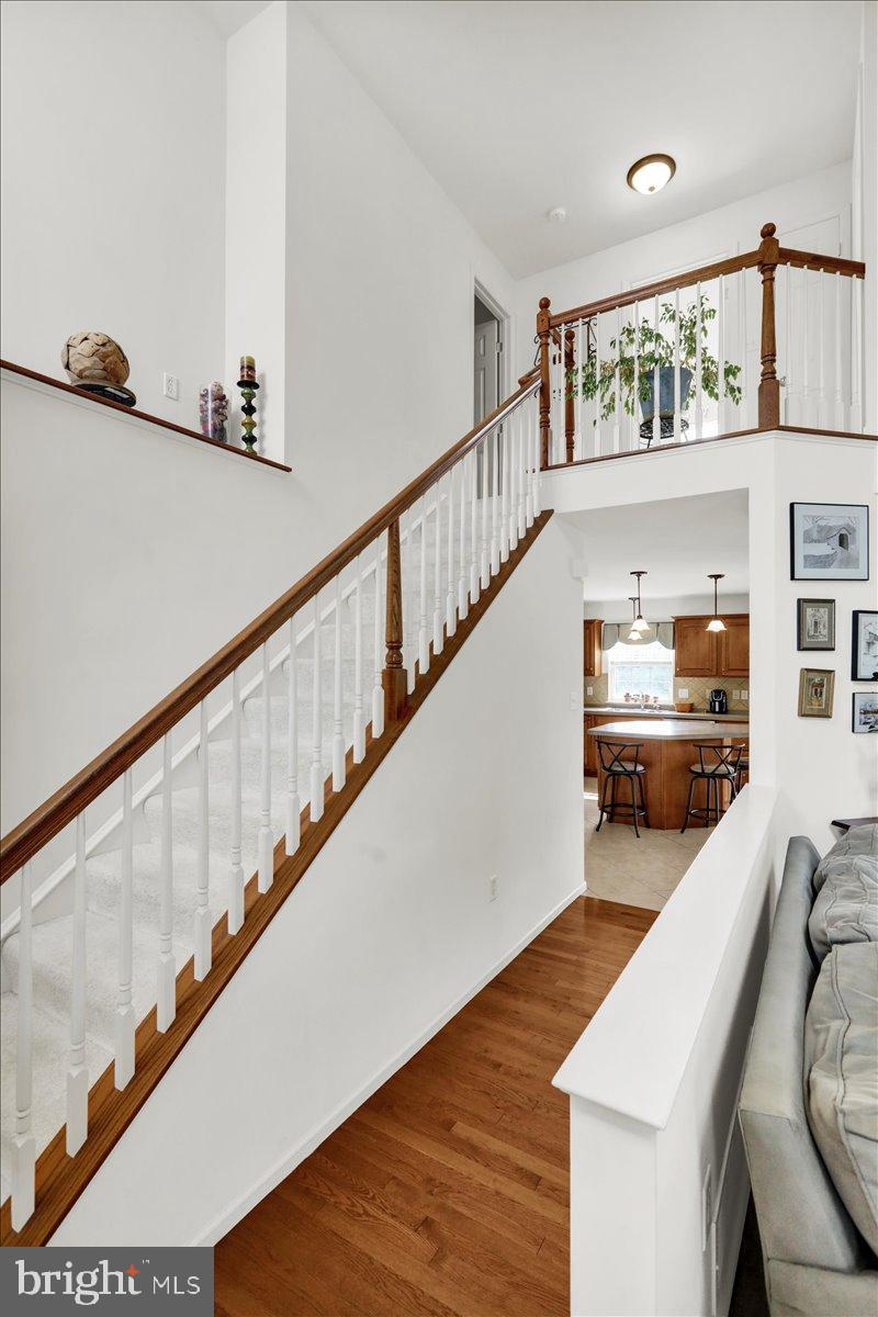 2509 Joshua Drive Sinking Spring, PA 19608 - Photo 10 of 35 a view of living room and kitchen with wooden floor