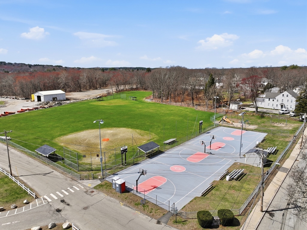 146 Hecla Street, Unit 2 Uxbridge, MA 01569 - Photo 25 of 26 an aerial view of a house with outdoor space