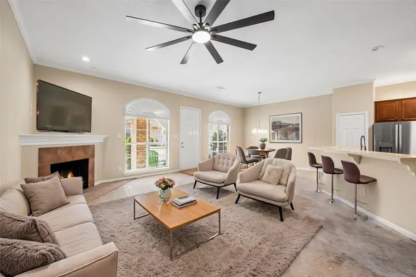 a kitchen with stainless steel appliances a stove microwave and sink