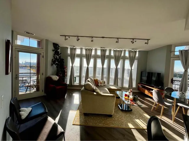 a room with gym equipment and a large window