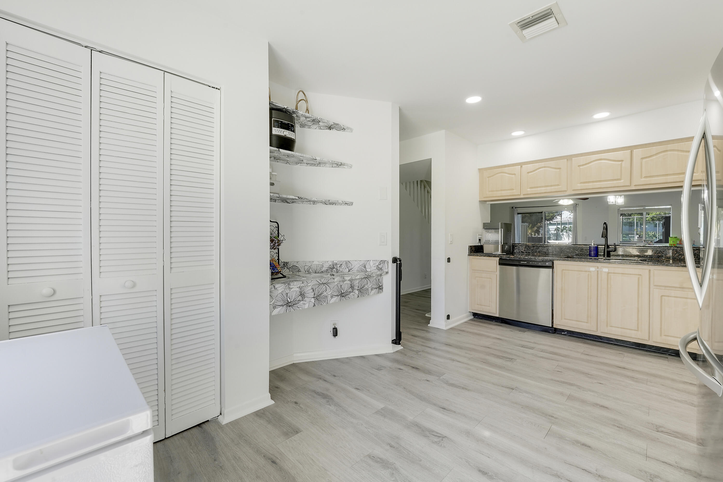 6263 Riverwalk Lane, Unit 2 Jupiter, FL 33458 - Photo 15 of 44 a bathroom with a tub and shower