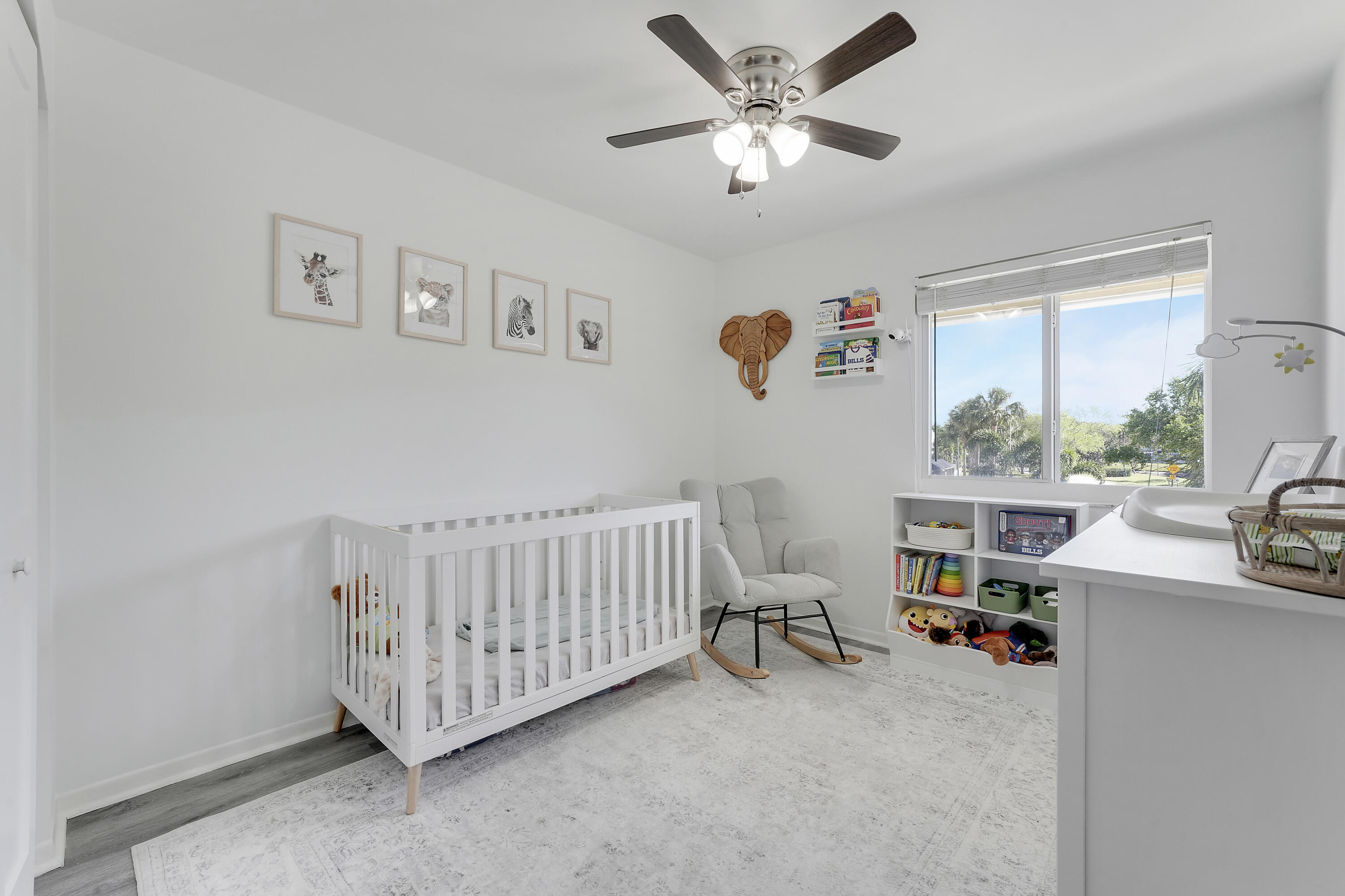6263 Riverwalk Lane, Unit 2 Jupiter, FL 33458 - Photo 30 of 44 a view of livingroom with furniture and windows