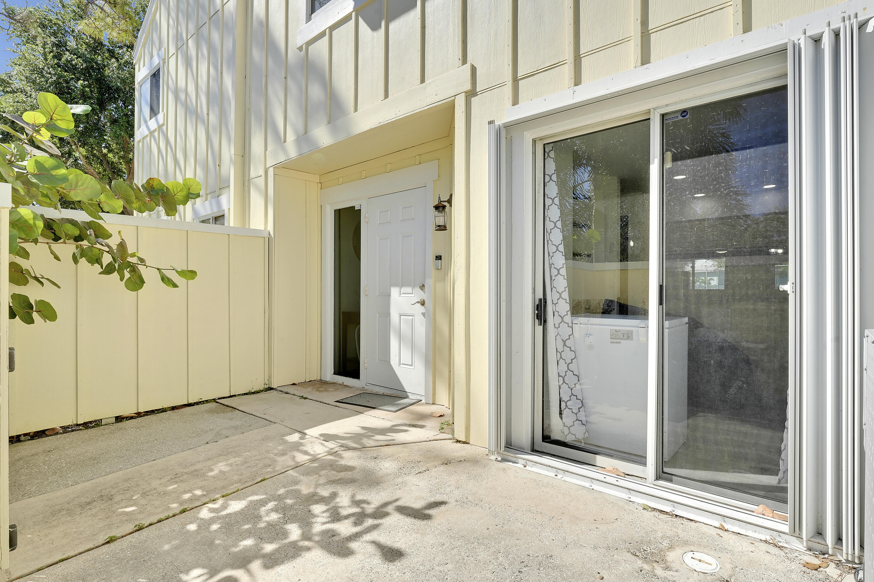 6263 Riverwalk Lane, Unit 2 Jupiter, FL 33458 - Photo 3 of 44 a view of a front door of a house