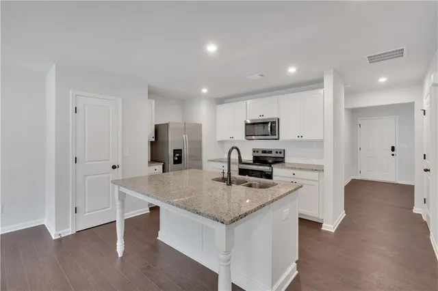 a view of kitchen with wooden floor