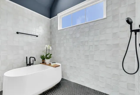 a view of a storage and utility room with a washer dryer