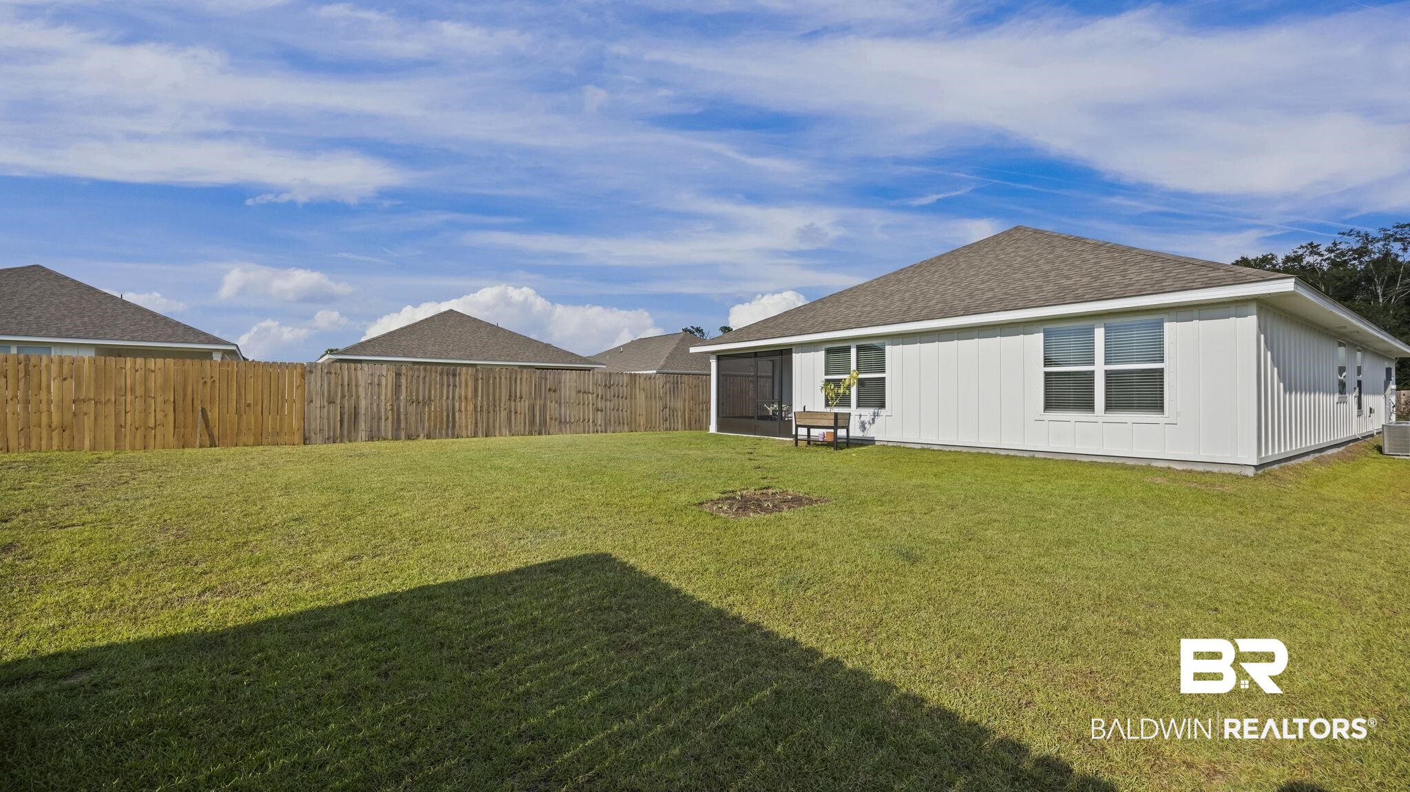 24264 Veranda Circle Elberta, AL 36530 - Photo 40 of 41 Fenced backyard with a sunroom