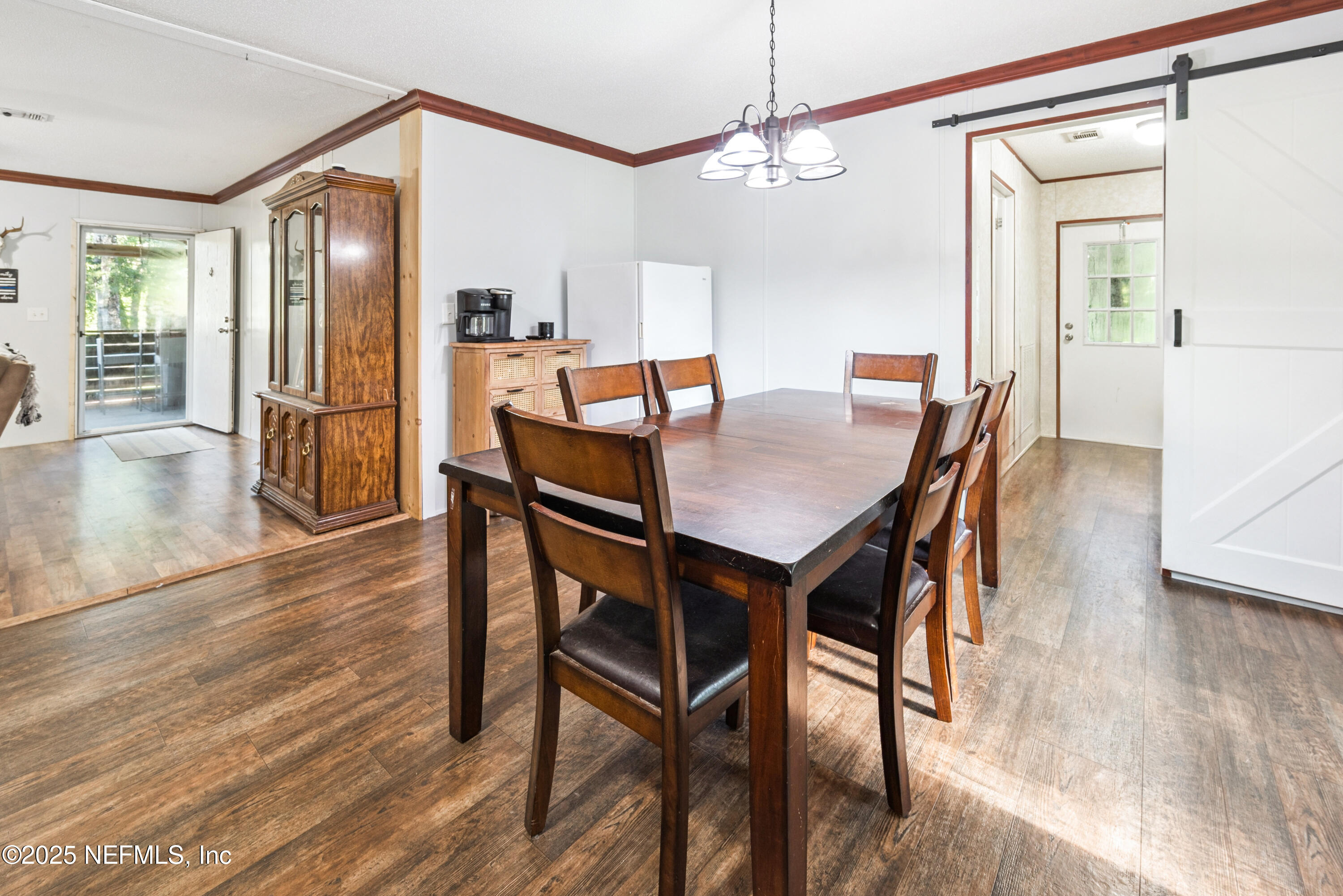 7236 Southeast 163rd Lane Lake Butler, FL 32054 - Photo 17 of 35 a dining room with furniture and window