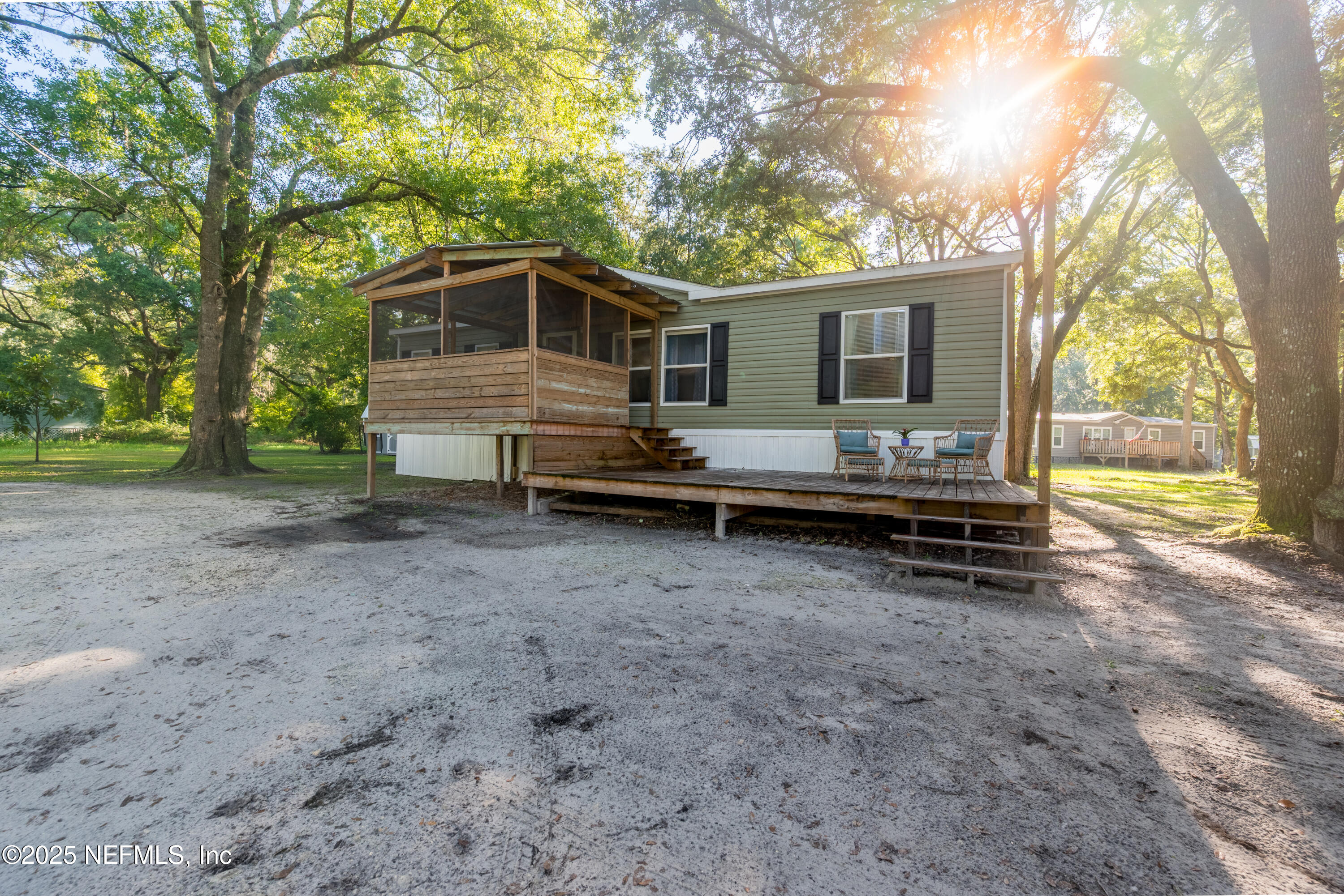 7236 Southeast 163rd Lane Lake Butler, FL 32054 - Photo 4 of 35 a view of house with backyard and seating area
