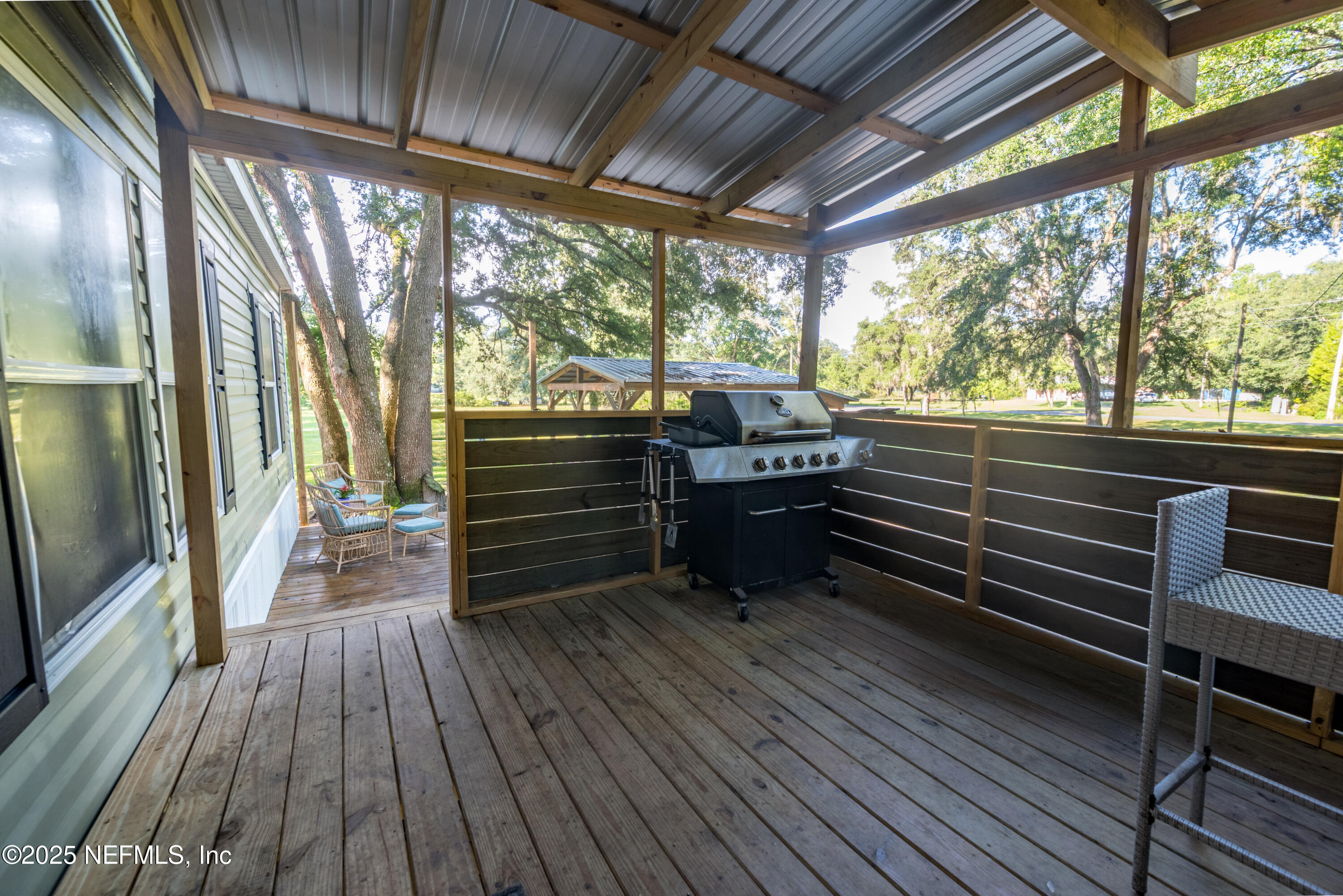 7236 Southeast 163rd Lane Lake Butler, FL 32054 - Photo 10 of 35 a view of outdoor space with wooden floor