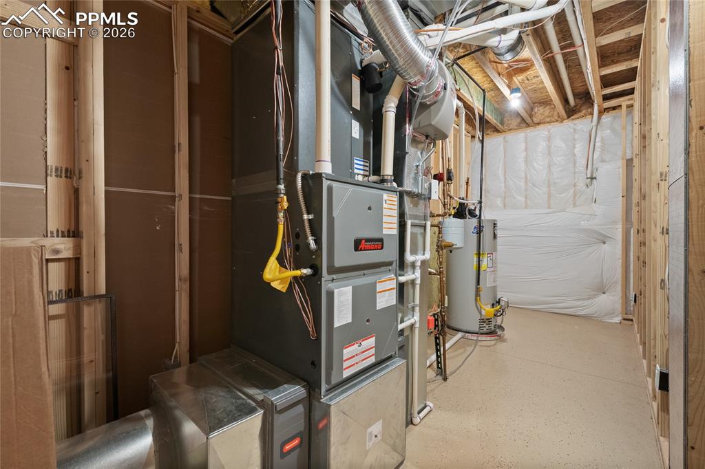 3718 Sky Rim Court Colorado Springs, CO 80908 - Photo 43 of 49 Large mechanical room with 2 humidifiers and whole house water filter and epoxy surface floors.