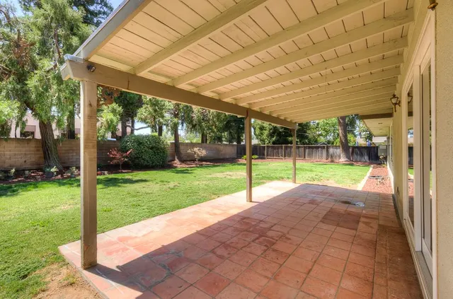 a view of a backyard with garden