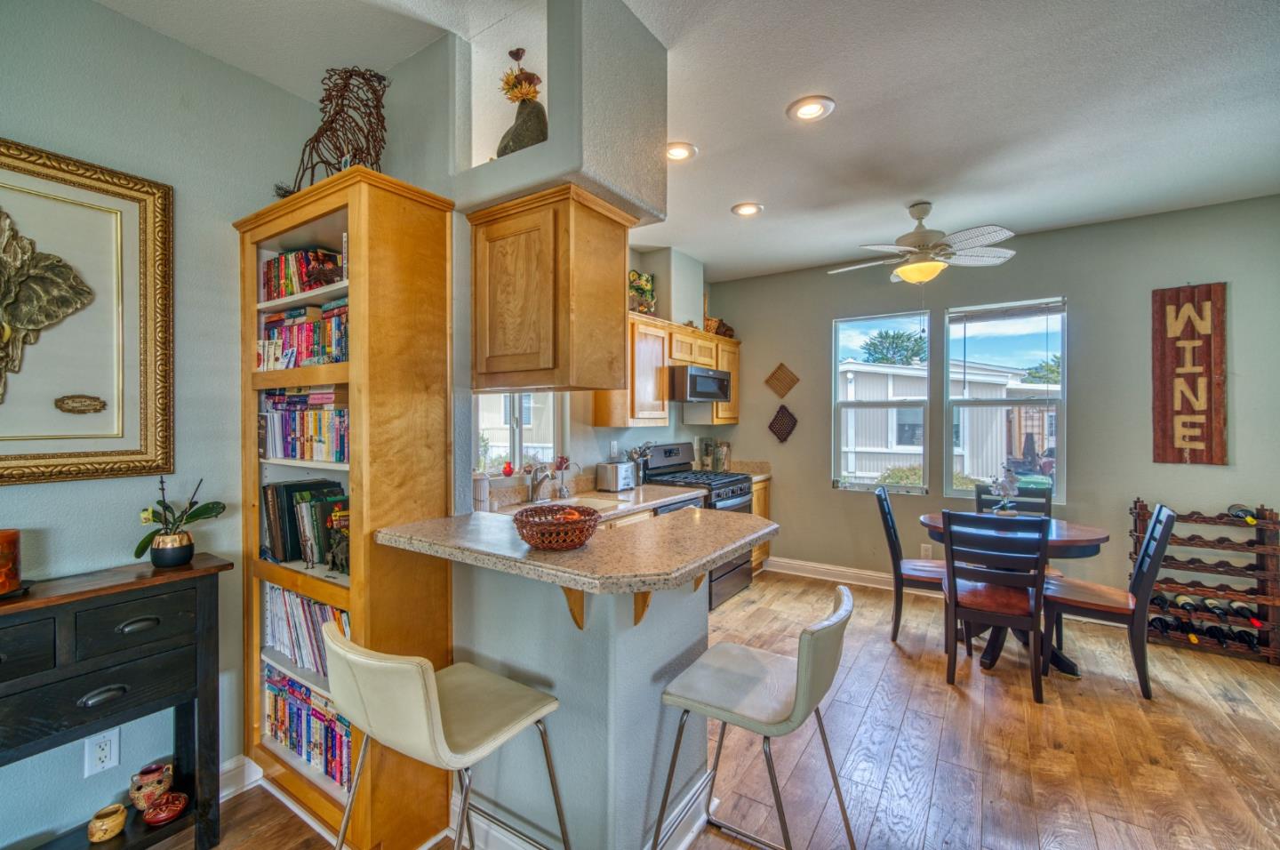 7 Lighthouse Road, Unit 7 Half Moon Bay, CA 94019 - Photo 11 of 22 a view of a dining room with furniture and a window