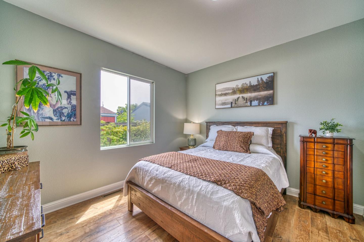 7 Lighthouse Road, Unit 7 Half Moon Bay, CA 94019 - Photo 16 of 22 a bedroom with a bed and a window