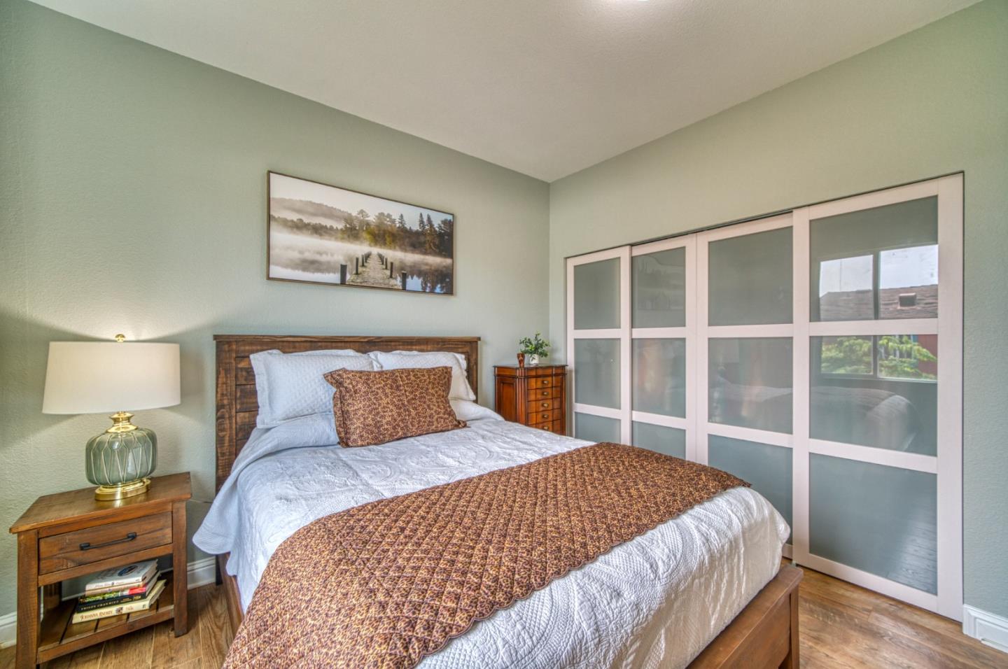 7 Lighthouse Road, Unit 7 Half Moon Bay, CA 94019 - Photo 17 of 22 a bedroom with a large bed and a large window