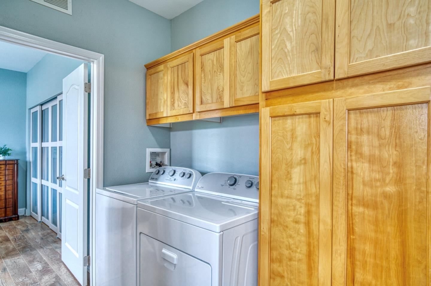 7 Lighthouse Road, Unit 7 Half Moon Bay, CA 94019 - Photo 20 of 22 a utility room with dryer and washer