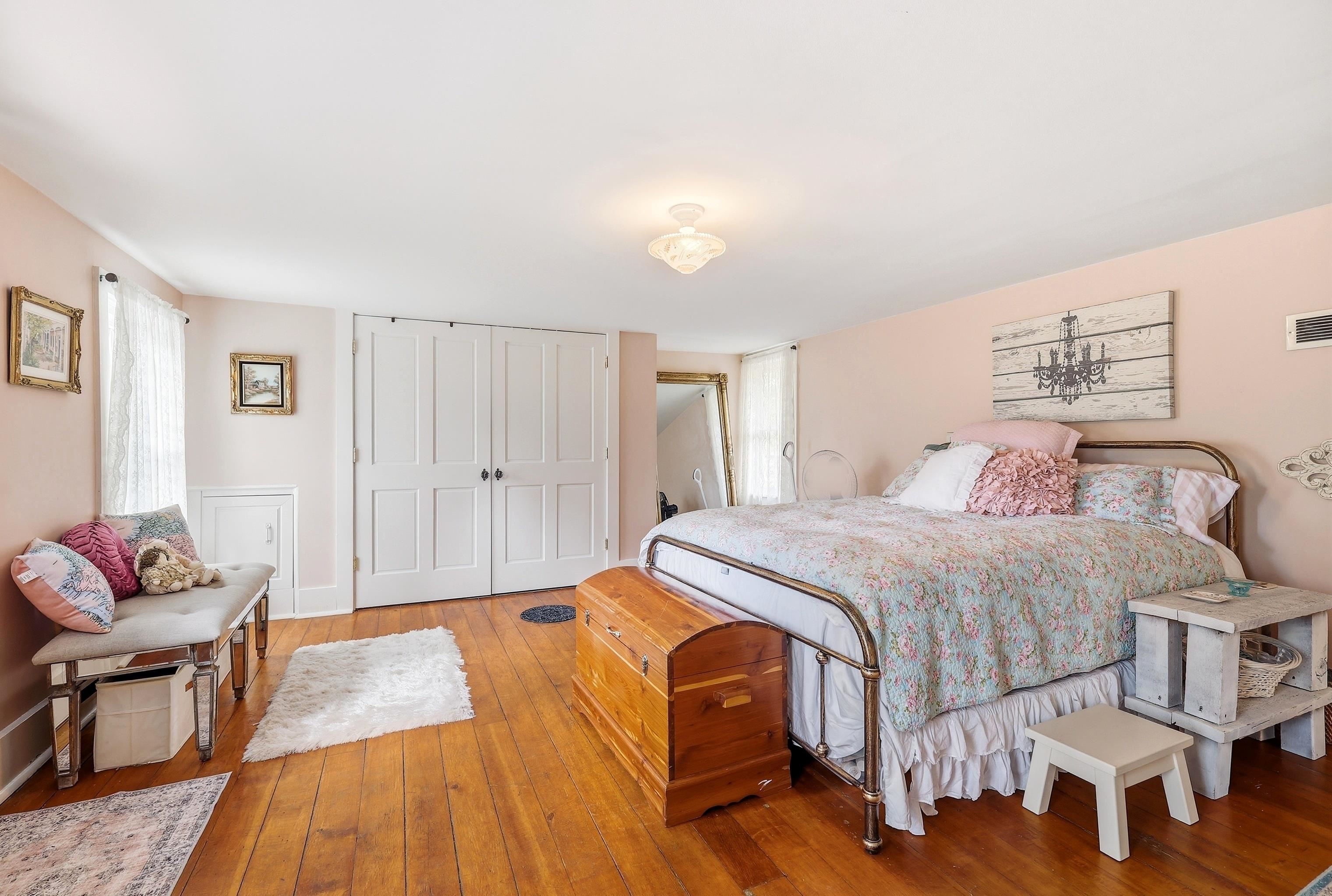 2562 West Blackjack Road Galena, IL 61036 - Photo 36 of 75 a spacious bedroom with a bed and chair