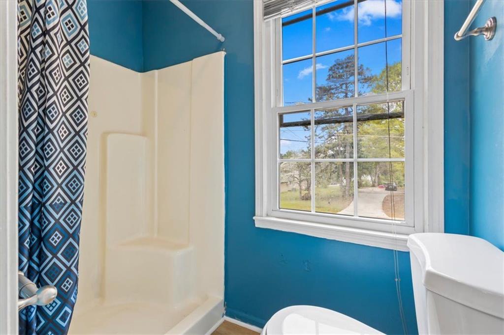 30 Paces Meadows Lane Dallas, GA 30157 - Photo 21 of 40 a bathroom with a sink and a mirror