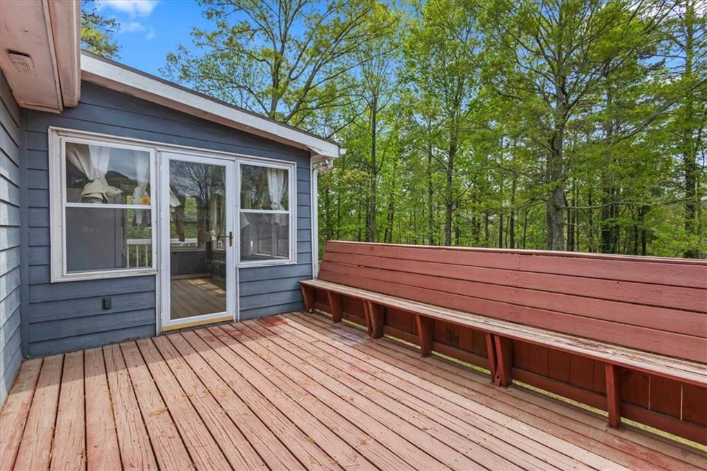 30 Paces Meadows Lane Dallas, GA 30157 - Photo 28 of 40 a view of backyard with deck and wooden floor
