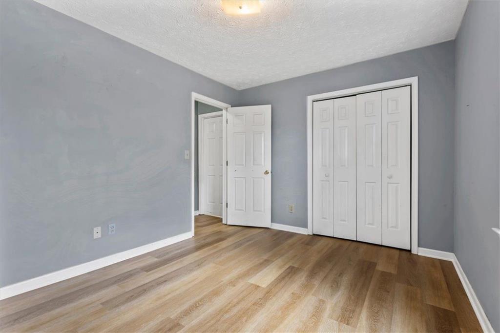 30 Paces Meadows Lane Dallas, GA 30157 - Photo 30 of 40 a view of an empty room and wooden floor