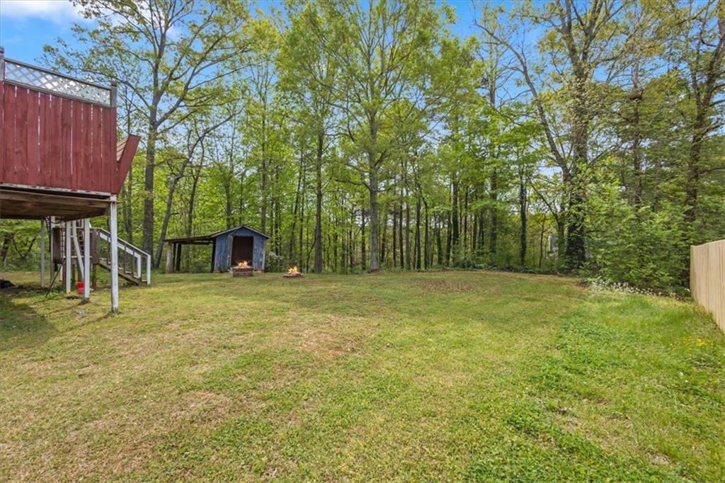 30 Paces Meadows Lane Dallas, GA 30157 - Photo 6 of 40 a view of a yard with a table and chair