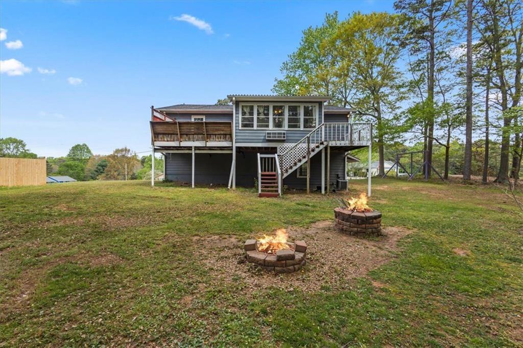 30 Paces Meadows Lane Dallas, GA 30157 - Photo 8 of 40 a front view of a house with a yard