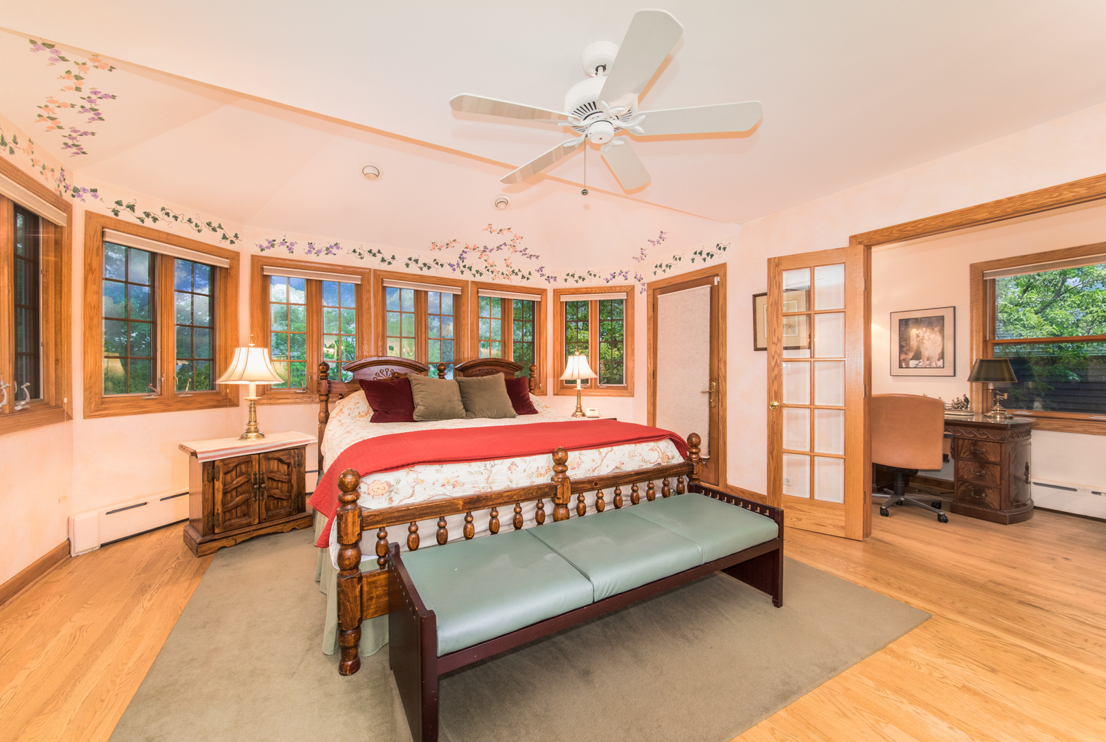 1605 South Fairview Avenue Park Ridge, IL 60068 - Photo 12 of 31 a bedroom with a bed mirror and a large window