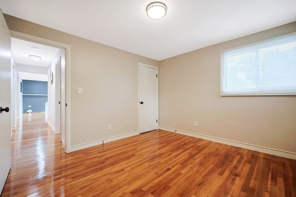 35 Deerfield Road Sharon, MA 02067 - Photo 14 of 31 a view of empty room with wooden floor