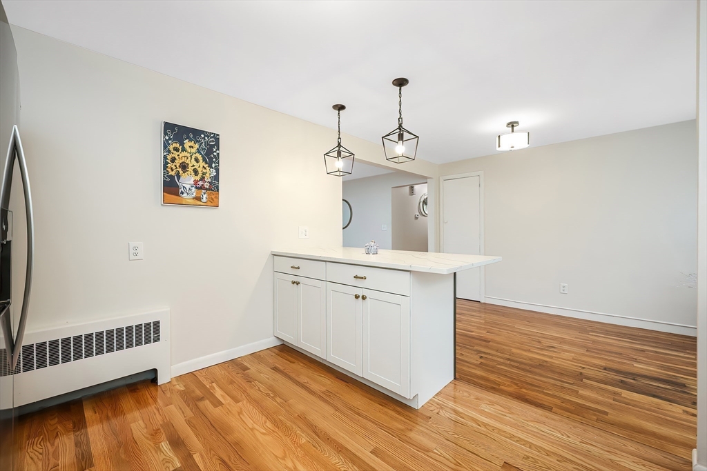 35 Deerfield Road Sharon, MA 02067 - Photo 19 of 31 a view of a hallway with wooden floor