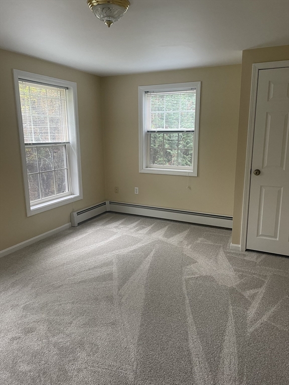 75 Downey Road North Brookfield, MA 01535 - Photo 30 of 42 an empty room with windows