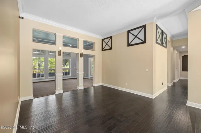 a kitchen with stainless steel appliances granite countertop a refrigerator and a stove