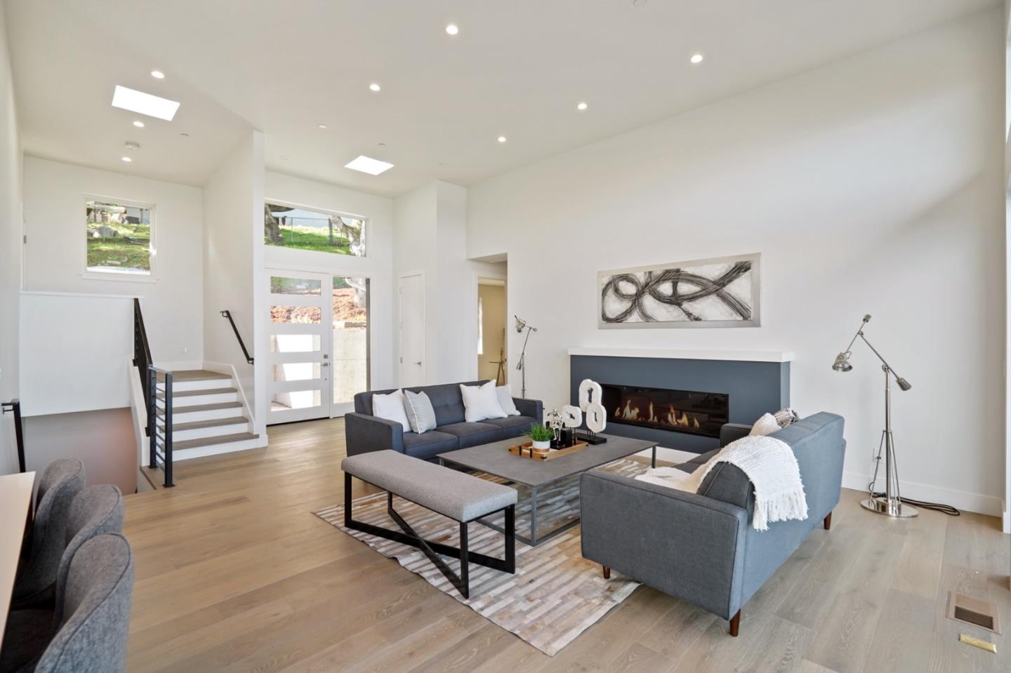 470 Erlin Drive San Carlos, CA 94070 - Photo 12 of 82 a living room with furniture and a fireplace